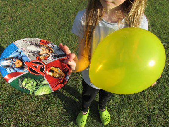 Preschool girl running fast and play catch-up and tag game